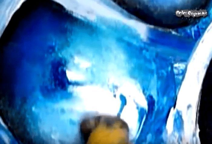 Blue abstract painting working with sponge techniques