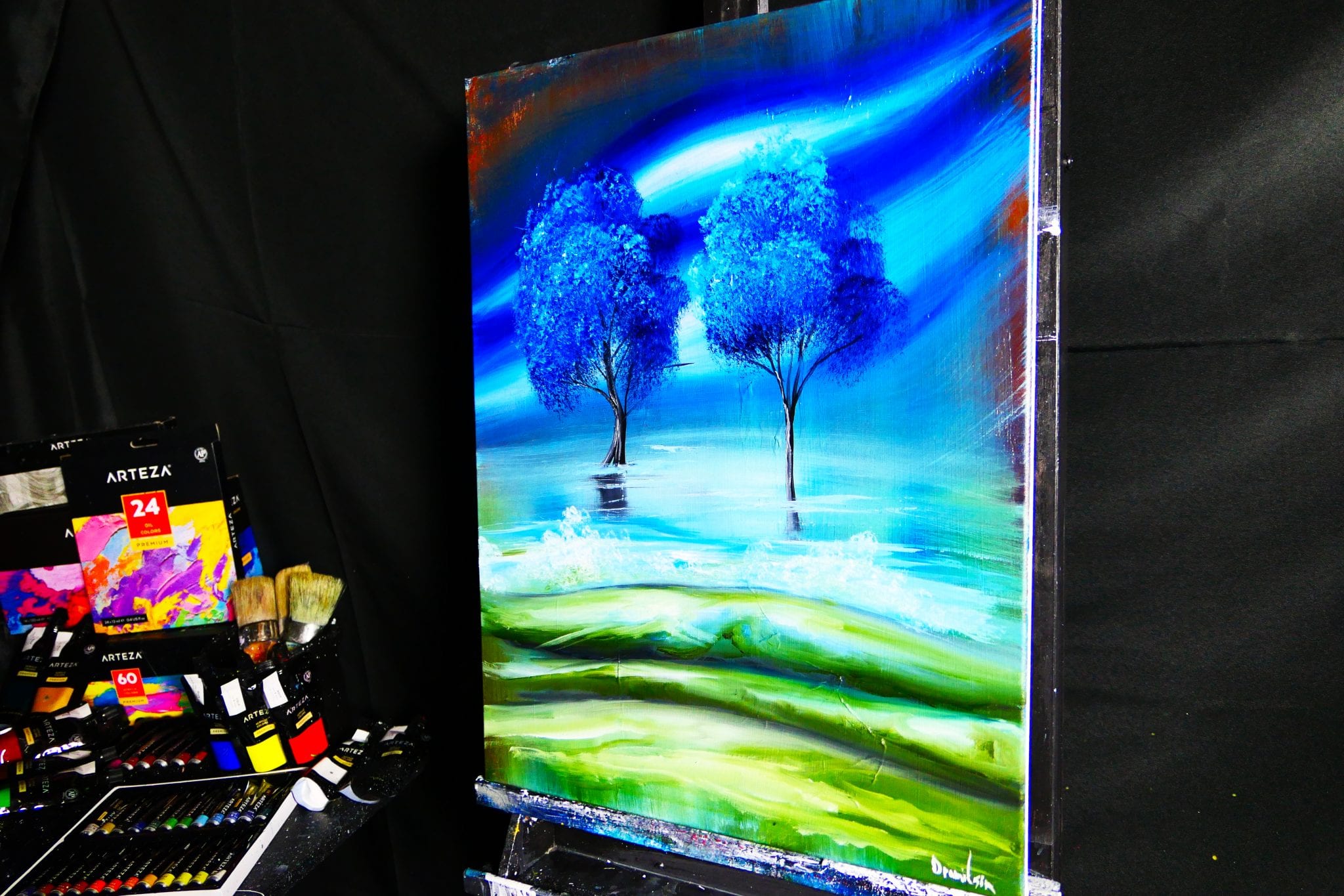 Lunar Reflection: The Magic of Two Blue Trees Under an Aurora